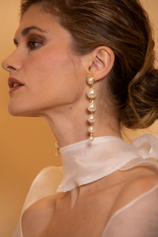 long pearl string earrings